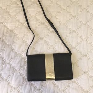 Kate Spade  Crossbody bag black with gold stripe
